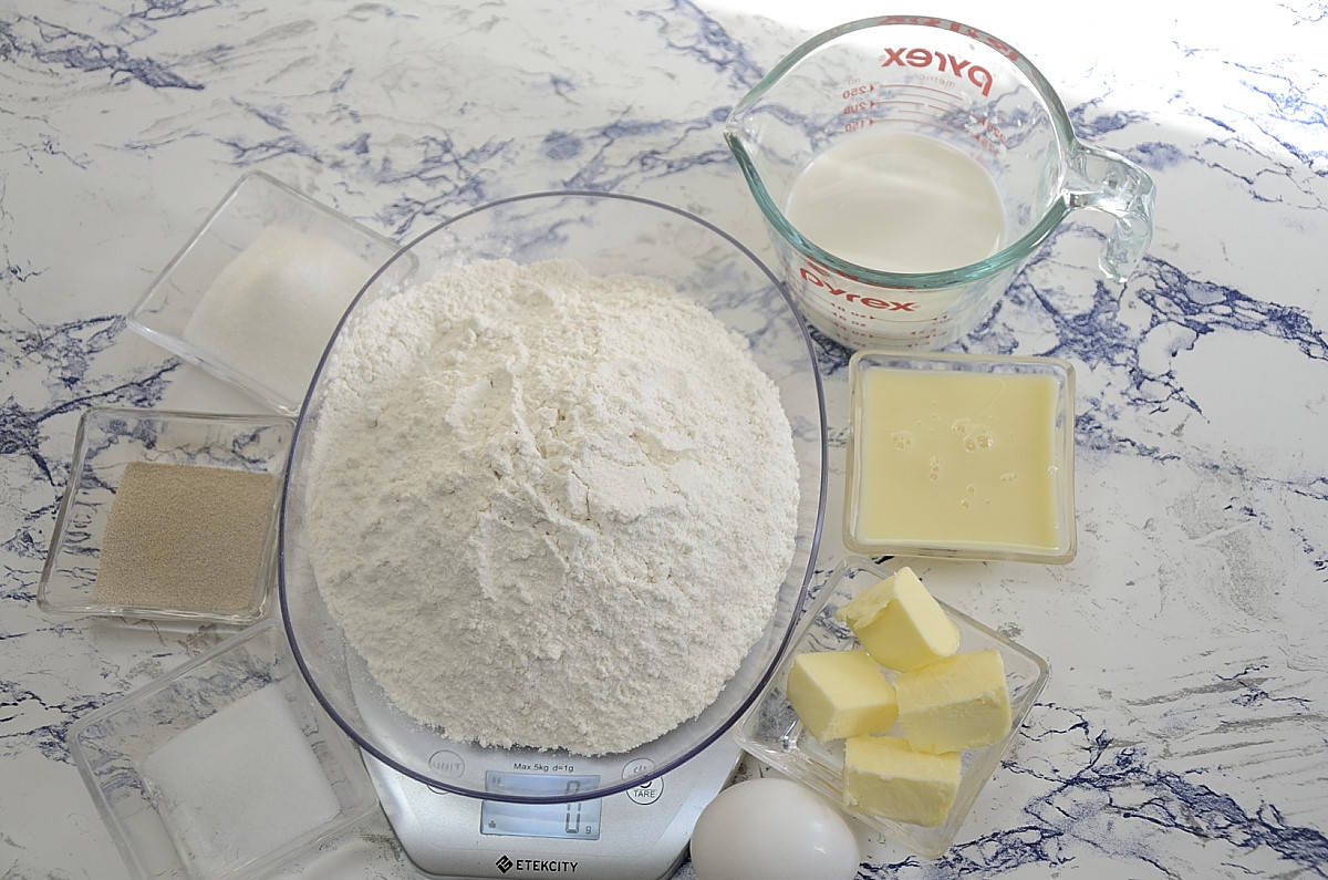 Flour, milk, butter, eggs and sweetened condensed milk to make dough.