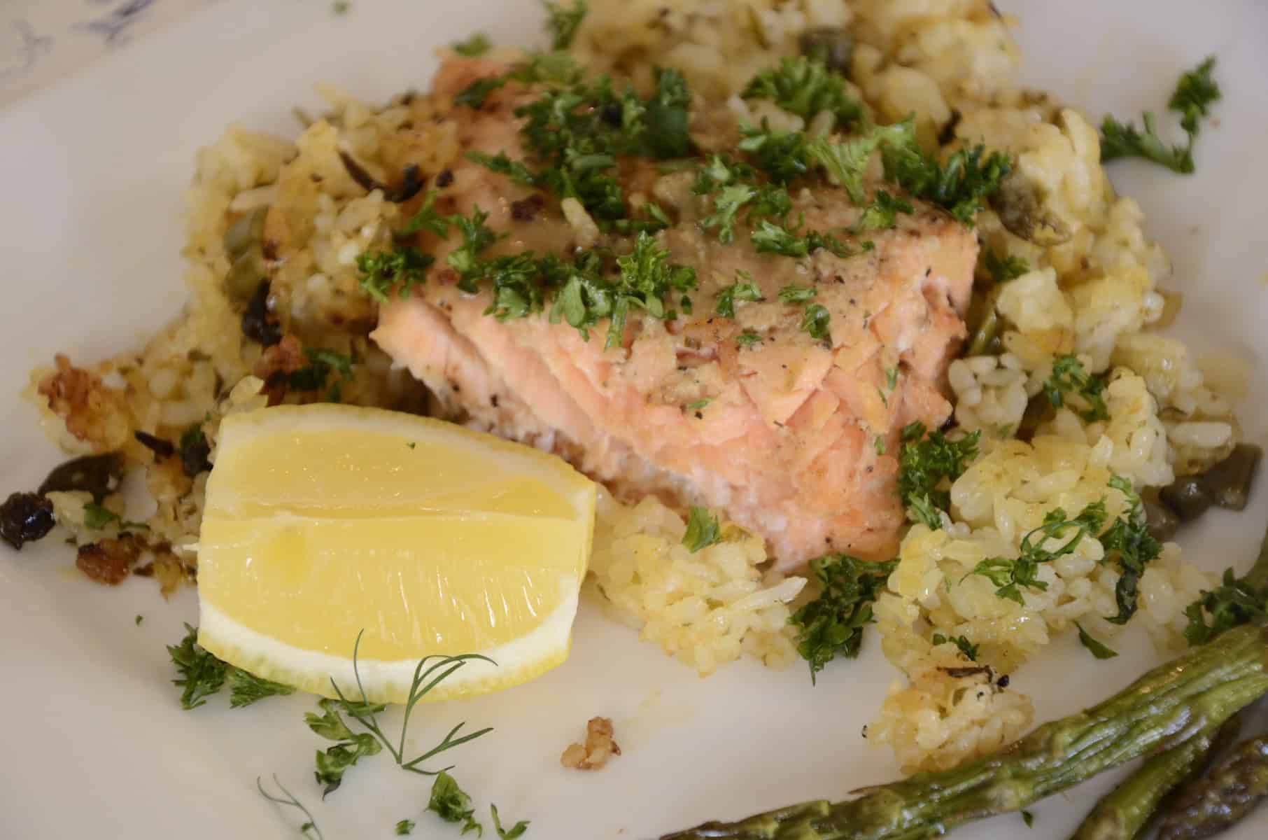 Salmon and crispy rice onn plate.